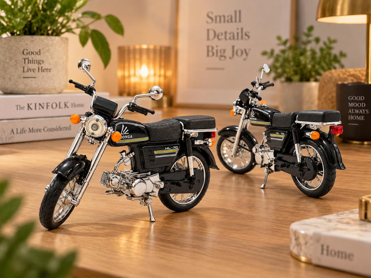 Black retro die-cast motorcycle model displayed on a desk