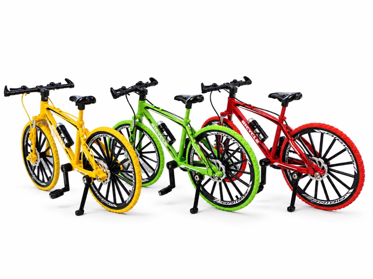 Three miniature mountain bike models in yellow, green and red colours